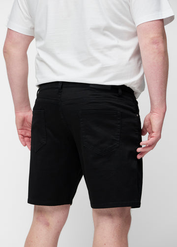 Black shorts for men in the colour Ravens seen from the back on a plus-size model.