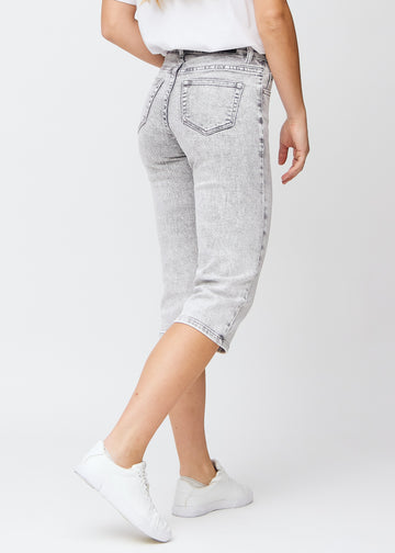 Light grey denim regular capris seen from the back, so the entire product can be seen.