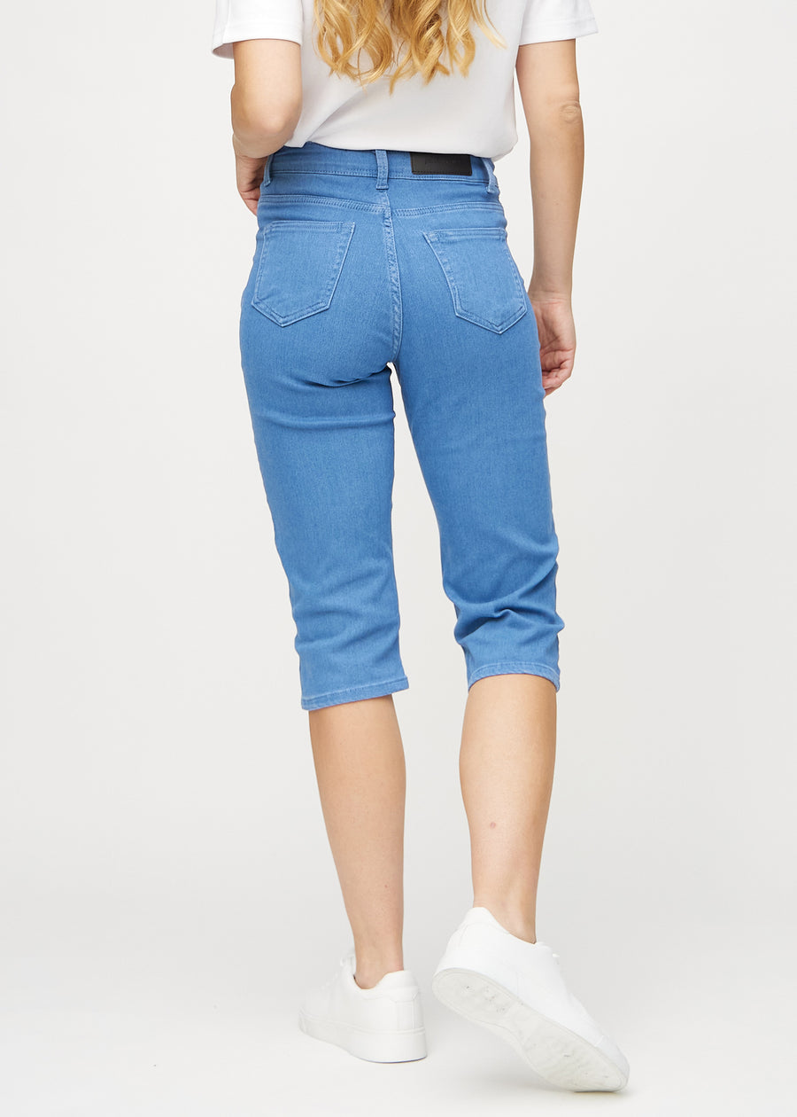 Blue regular capris seen from the back, so the entire product can be seen.