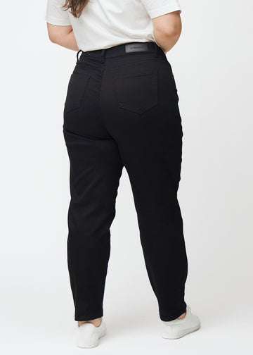 Black high-waisted regular jeans seen from the back on a plus-size model, so the entire product can be seen.