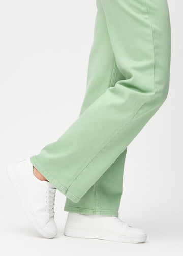 The ankles of a model, so you can see how loose the jeans fit.