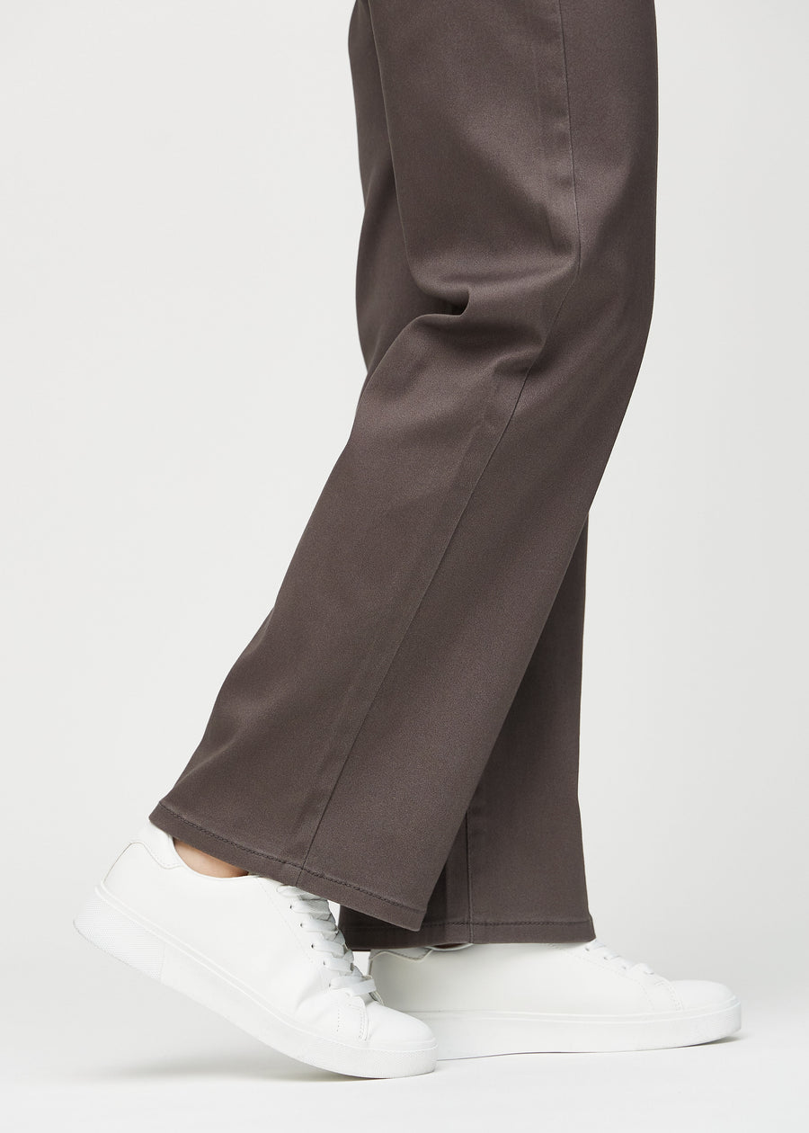 The ankles of a model, so you can see how loose the jeans fit.