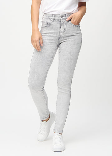 Light grey denim skinny jeans, model name Ashes, which fits tightly along the leg, seen from the front.