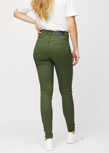 Dark green skinny jeans seen from the back, so the full product can be seen.