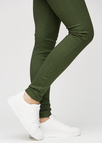 The ankles of a model, so you can see how loose or tight the jeans fit.