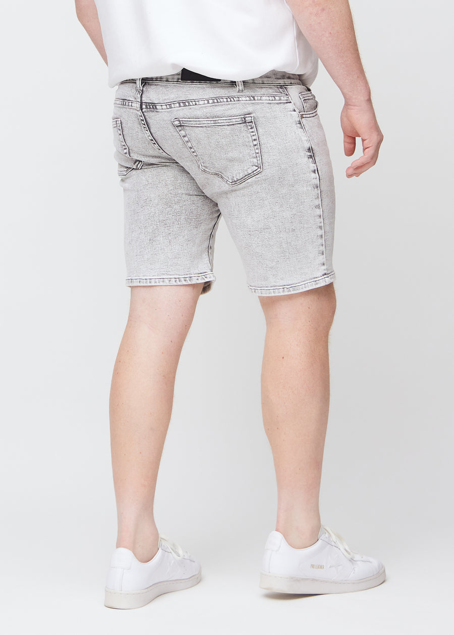 Light grey denim middle-slim shorts seen from the back on a plus-size model, so the entire product can be seen.